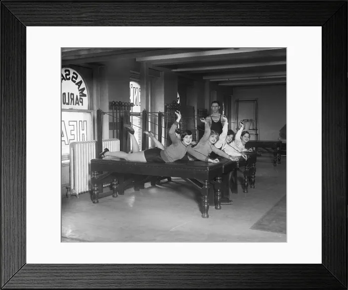 Framed Print : Women Doing Excercises At Gym