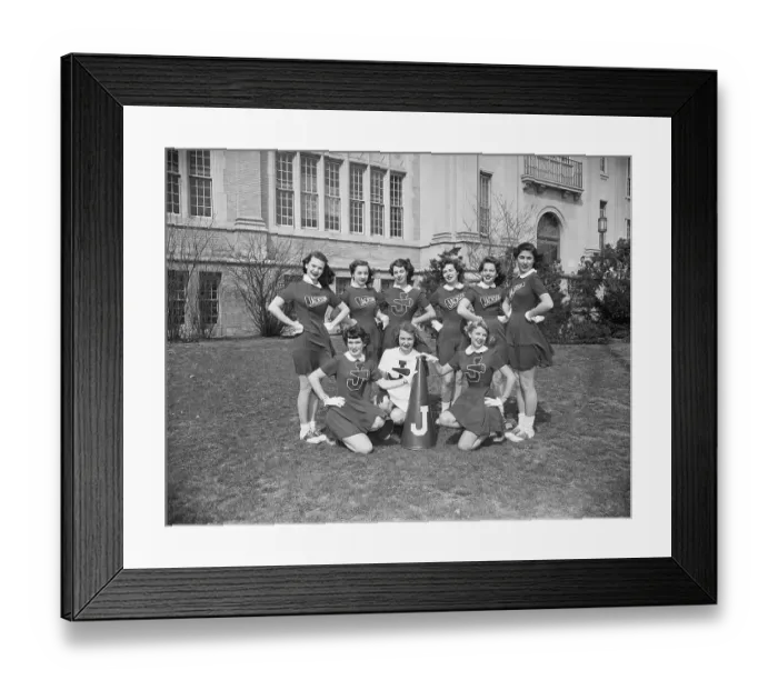 Framed Print : Cheerleaders Posing In Uniforms Framed Print : Cheerleaders Posing In Uniforms