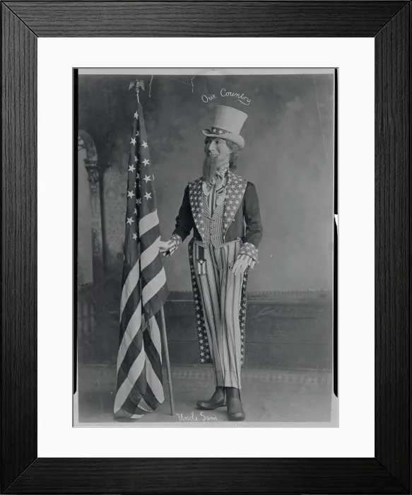 Framed Print : Man Dressed as Uncle Sam Grasping American Flag Framed Print : Man Dressed as Uncle Sam Grasping American Flag