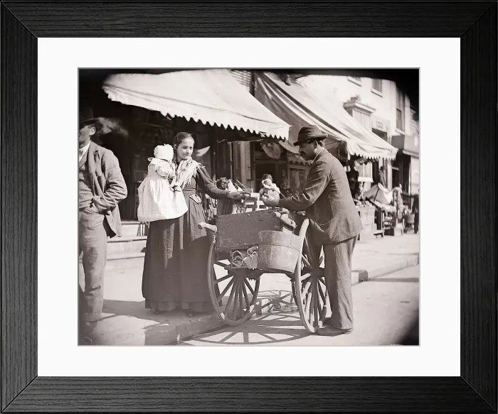 Framed Print : Woman Buying From Huckster On Street Framed Print : Woman Buying From Huckster On Street