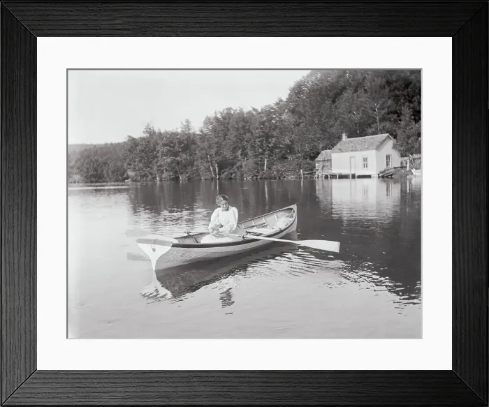 Framed Print : Girl Sitting in Rowboat