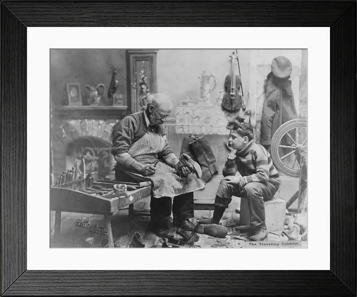 Framed Print : Shoemaker Preparing Shoes for Young Boy Framed Print : Shoemaker Preparing Shoes for Young Boy