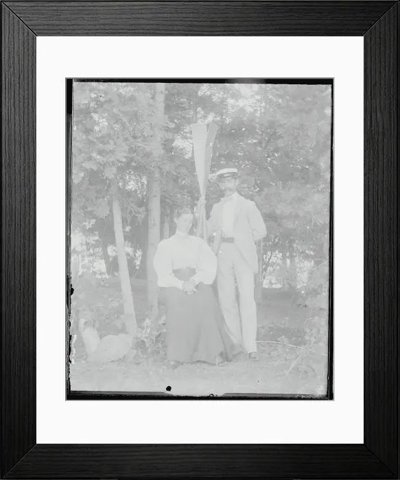 Framed Print : Couple Relaxing in Woods Framed Print : Couple Relaxing in Woods
