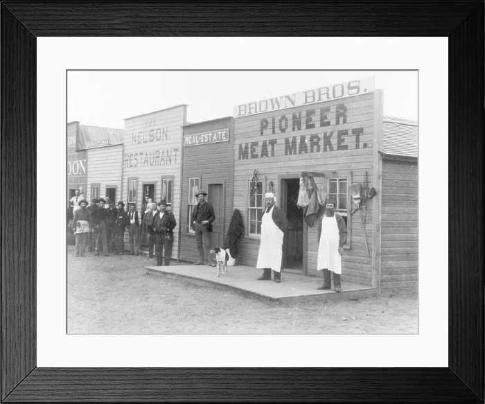 Framed Print : Shopkeepers and Customers Along Storefronts Framed Print : Shopkeepers and Customers Along Storefronts