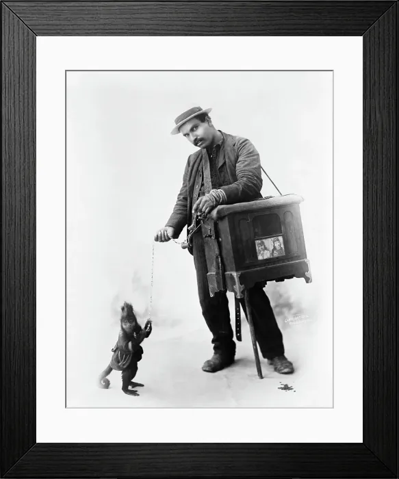 Framed Print : Organ Grinder And Monkey Collect Money Framed Print : Organ Grinder And Monkey Collect Money