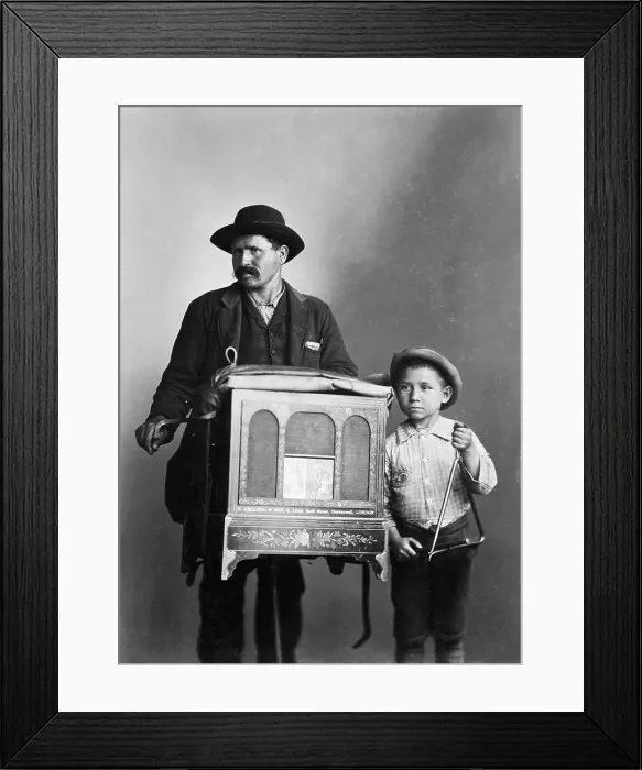 Framed Print : An Organ Grinder Framed Print : An Organ Grinder