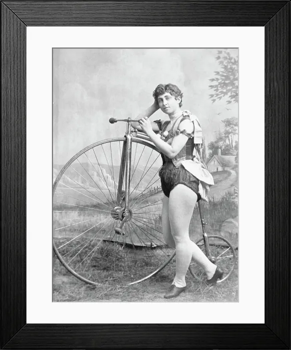 Framed Print : Lady Circus Bicyclist with Penny-Farthing Bicycle Framed Print : Lady Circus Bicyclist with Penny-Farthing Bicycle