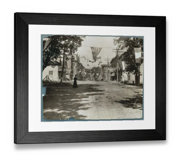 Framed Print : Woman on American Flag Draped Street