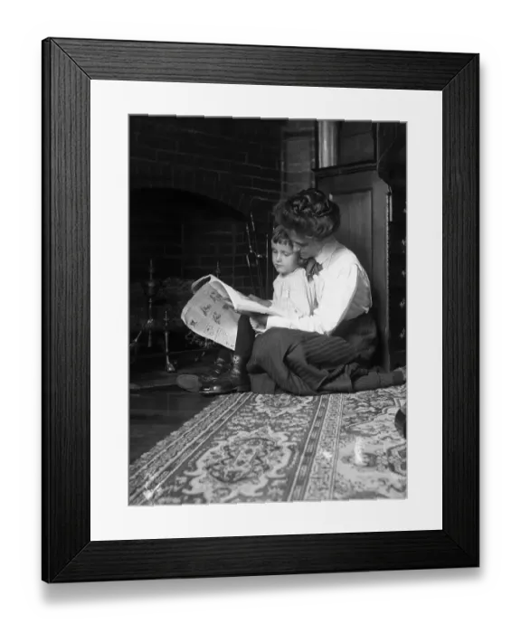 Framed Print : Mother and Child Reading by Fireplace Framed Print : Mother and Child Reading by Fireplace