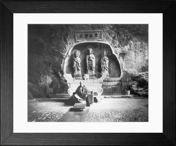 Framed Print : Monk with Buddhist Statues Framed Print : Monk with Buddhist Statues