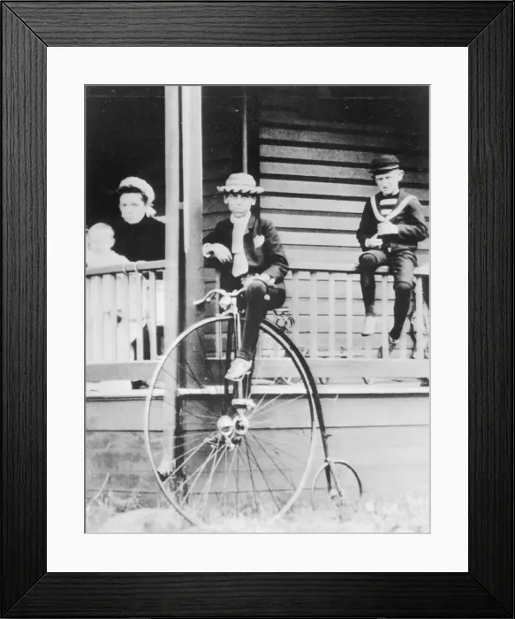 Framed Print : Young Alfred Sloan on penny-farthing bicycle