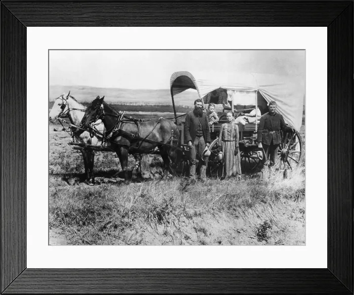 Framed Print : Emigrants Moving with Covered Wagon Framed Print : Emigrants Moving with Covered Wagon