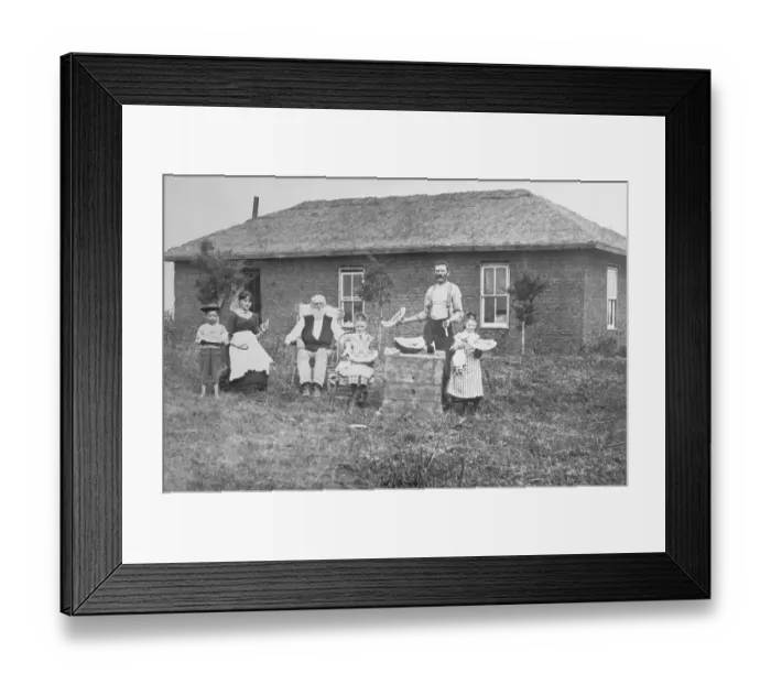 Framed Print : Family Relaxing Outside Their Farm House Framed Print : Family Relaxing Outside Their Farm House