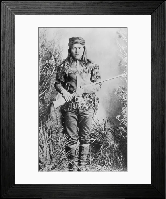 Framed Print : Peaches Holding Rifle
