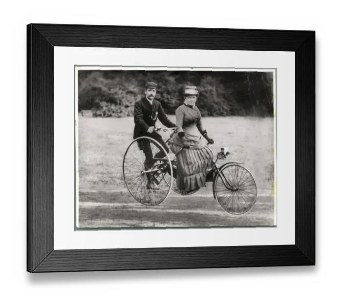 Framed Print : British Couple Riding Tricycle Framed Print : British Couple Riding Tricycle