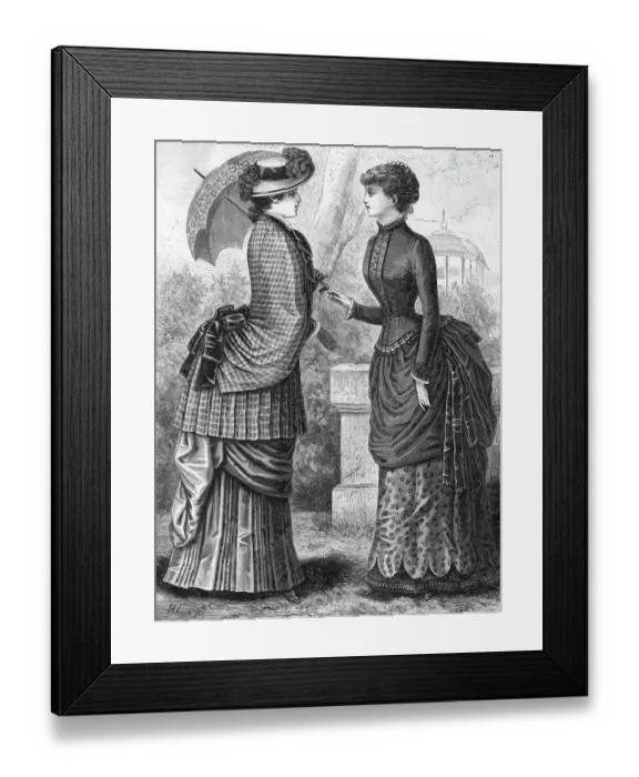 Framed Print : Engraving of A Woman Wearing a Cheviot Mantle and a Woman Wearing a Camel's Hair Hari and Silk Dress (1883) Framed Print : Engraving of A Woman Wearing a Cheviot Mantle and a Woman Wearing a Camel's Hair Hari and Silk Dress (1883)