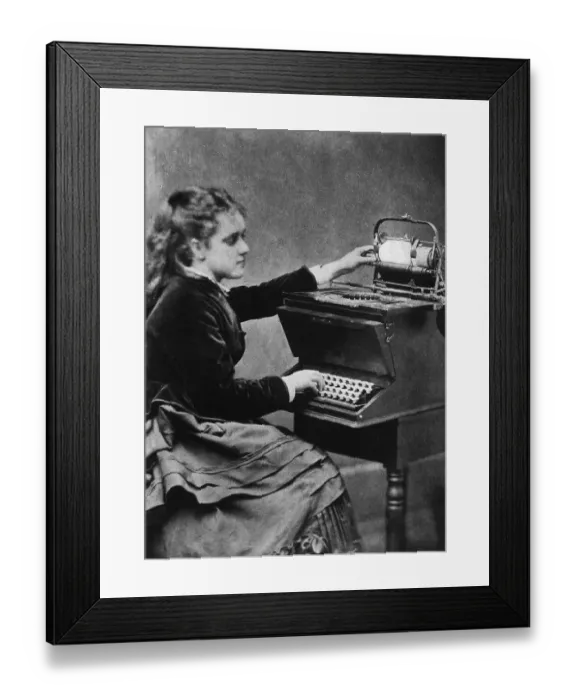 Framed Print : A Young Woman with an Early Typewriter Framed Print : A Young Woman with an Early Typewriter