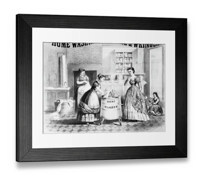 Framed Print : Woman Using Home Washing Machine Framed Print : Woman Using Home Washing Machine
