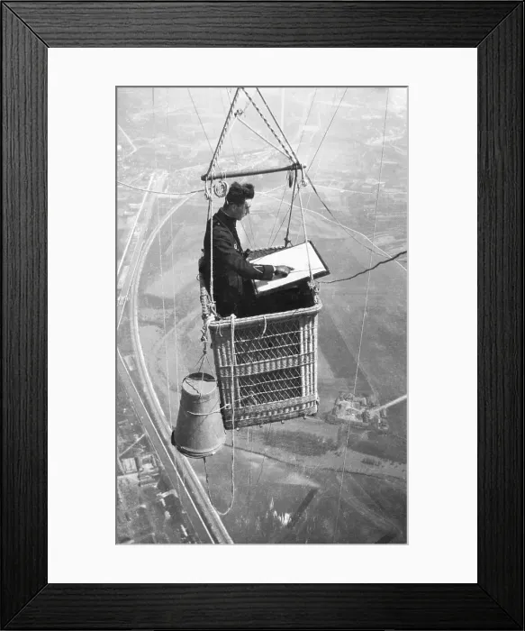 Framed Print : Man Mapping Terrain from Balloon