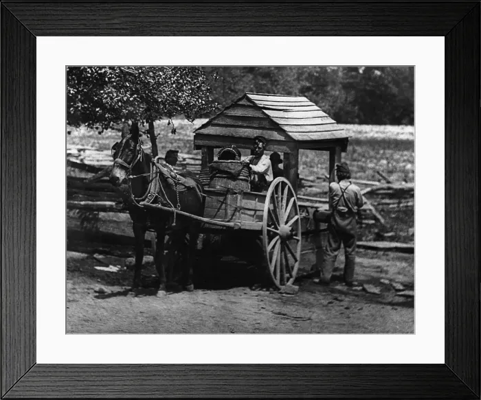 Framed Print : Filling water barrels from a well Framed Print : Filling water barrels from a well
