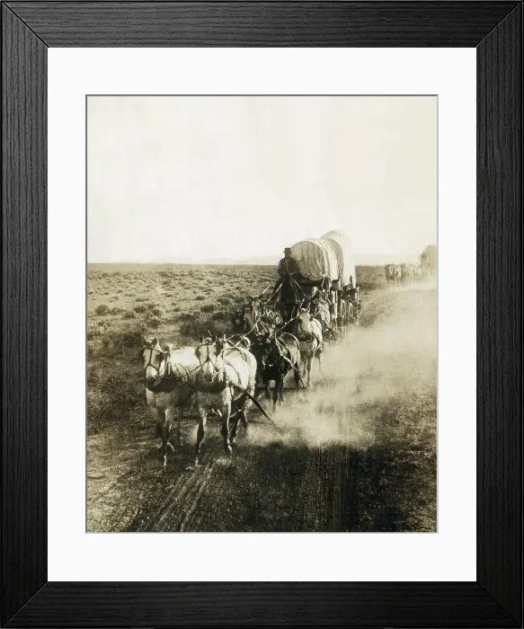Framed Print : Covered Wagons on the Plains Going West
