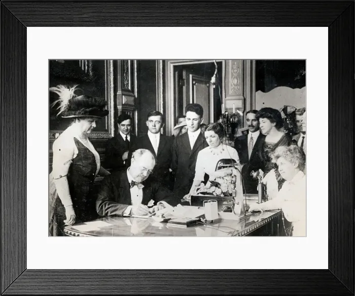Framed Print : Governor Dunne and Wife as He Signs Voting Bill for Women Framed Print : Governor Dunne and Wife as He Signs Voting Bill for Women