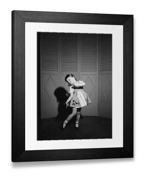 Framed Print : A little girl strikes a curiously dramatic pose against a screen backdrop, circa 1950. (Photo by H. Armstrong Roberts / Retrofile / Getty Images) Framed Print : A little girl strikes a curiously dramatic pose against a screen backdrop, circa 1950. (Photo by H. Armstrong Roberts / Retrofile / Getty Images)