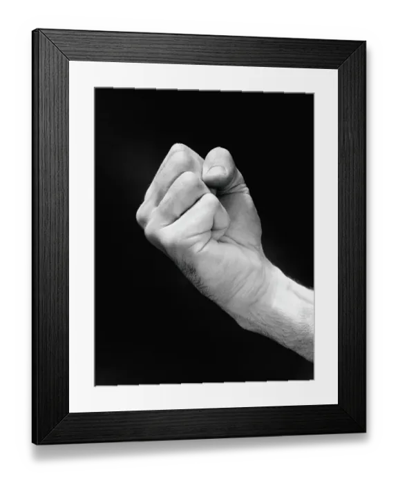 Framed Print : Man's hand making fist Framed Print : Man's hand making fist