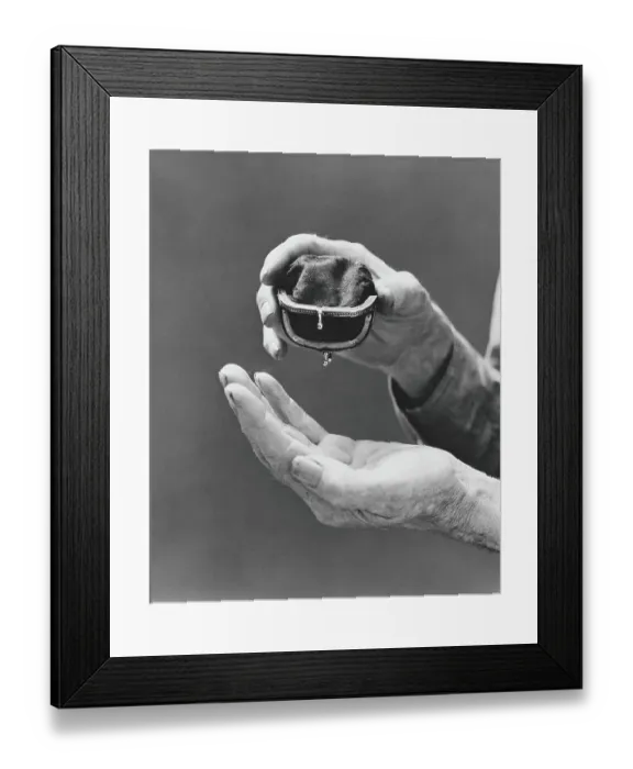 Framed Print : Elderly man's soiled hands turning empty change purse upside down Framed Print : Elderly man's soiled hands turning empty change purse upside down