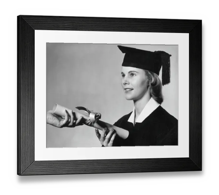 Framed Print : Young female graduate receiving diploma with ribbon around it Framed Print : Young female graduate receiving diploma with ribbon around it