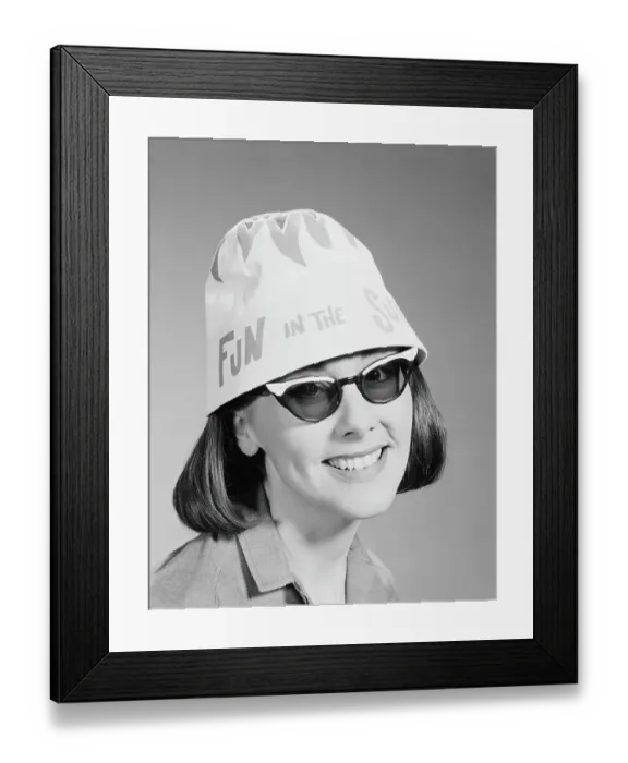 Framed Print : Woman wearing sunglasses and fun in the sun hat, portrait