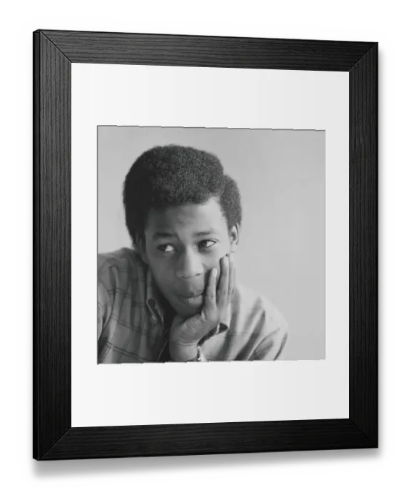 Framed Print : Teenage boy with head in hands, looking off to one side Framed Print : Teenage boy with head in hands, looking off to one side