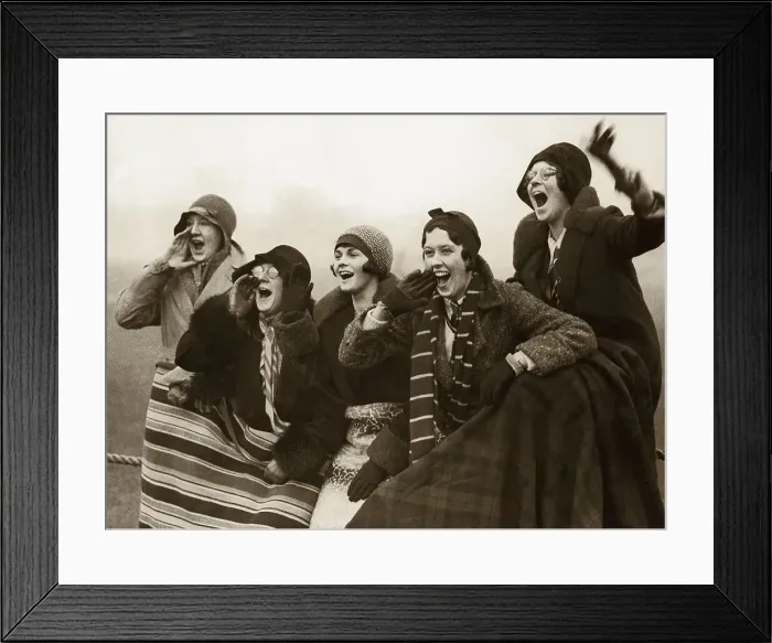 Framed Print : GROUP OF WOMEN SPECTATORS CHEERING, WRAPPED IN BLANKETS Framed Print : GROUP OF WOMEN SPECTATORS CHEERING, WRAPPED IN BLANKETS
