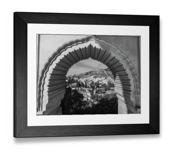 Framed Print : View of the town of Ubeda through a decorative archway Framed Print : View of the town of Ubeda through a decorative archway