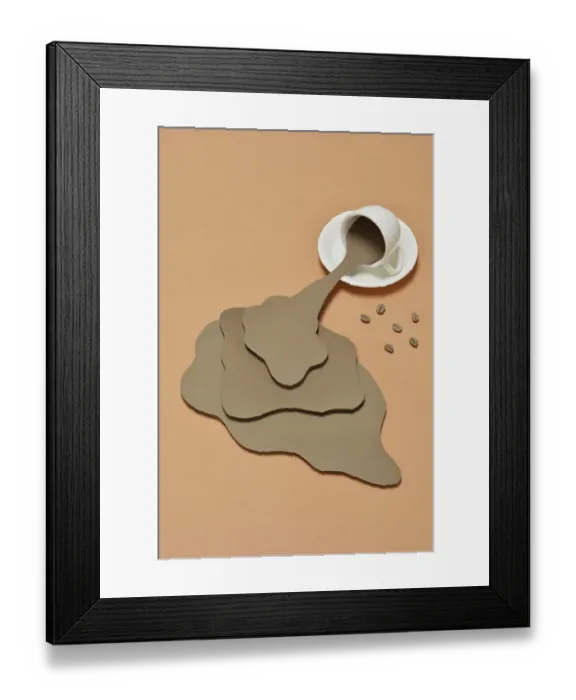 Framed Print : Coffee Spilling out from a coffee cup Framed Print : Coffee Spilling out from a coffee cup