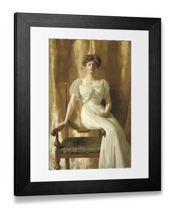 Framed Print : A woman in an ivory-coloured dress sits on an ornate chair against a golden background Framed Print : A woman in an ivory-coloured dress sits on an ornate chair against a golden background