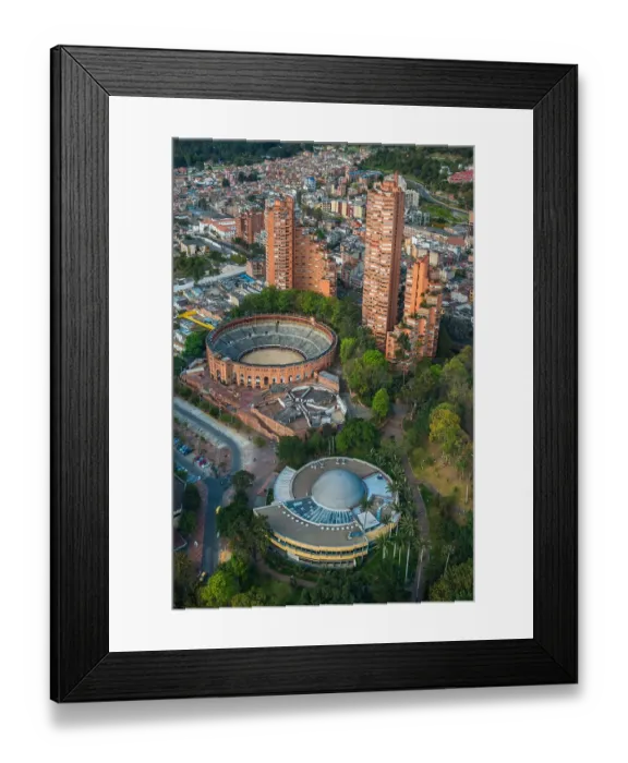 Framed Print : Vertical aerial view of the famous Santamaria Bullfighting arena and the surrounding buildings Framed Print : Vertical aerial view of the famous Santamaria Bullfighting arena and the surrounding buildings