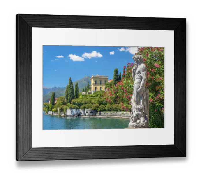 Framed Print : Varenna, Lombardy, Italy - July 2022: Statue in Villa Monastero overlooking Lake Como Framed Print : Varenna, Lombardy, Italy - July 2022: Statue in Villa Monastero overlooking Lake Como