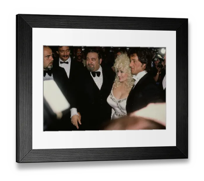 Framed Print : Dolly Parton And Sylvester Stallone Attend Rhinestone Framed Print : Dolly Parton And Sylvester Stallone Attend Rhinestone