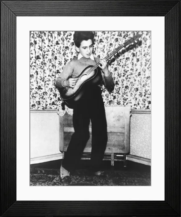 Framed Print : Young Beatles Guitarist Framed Print : Young Beatles Guitarist