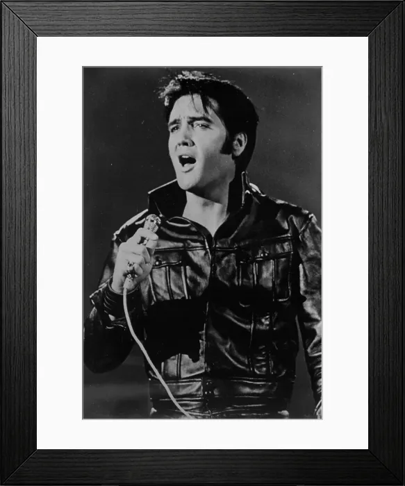 Framed Print : Rock and roll musician Elvis Presley performing Framed Print : Rock and roll musician Elvis Presley performing