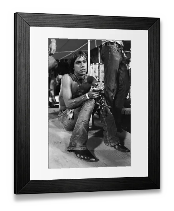 Framed Print : Iggy Pop wearing a dog collar on stage at a performance by The Stooges Framed Print : Iggy Pop wearing a dog collar on stage at a performance by The Stooges