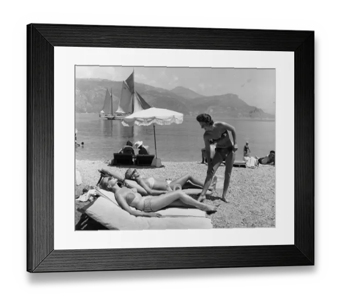 Framed Print : Sunbathing On Beach