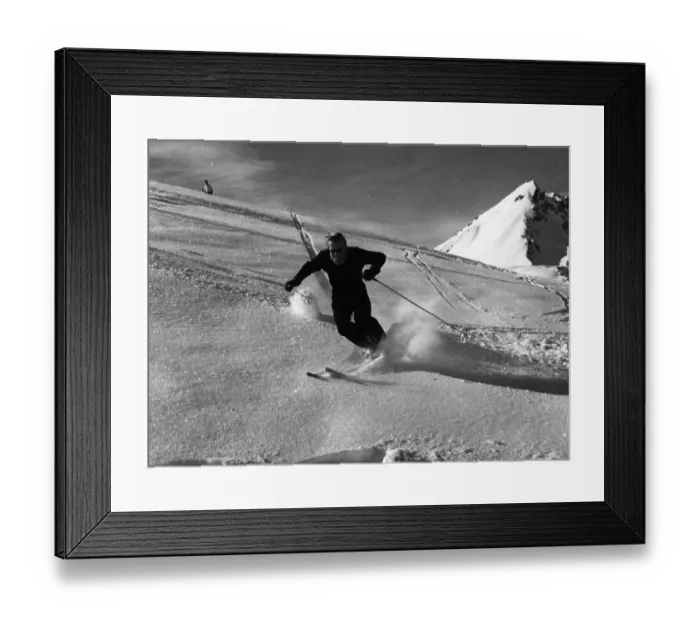 Framed Print : Ski Run. A skier in action in the Swiss ski resort of Klosters Framed Print : Ski Run. A skier in action in the Swiss ski resort of Klosters