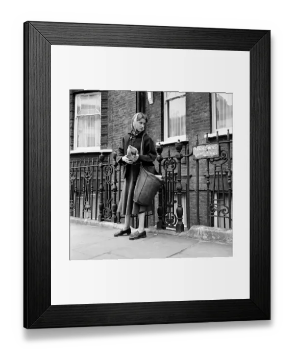 Framed Print : Newspaper Girl Framed Print : Newspaper Girl