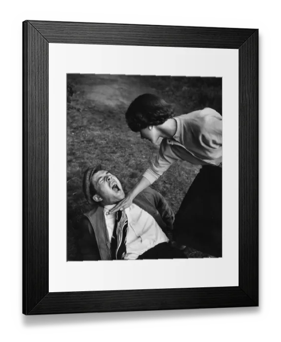 Framed Print : The Chop. 24th October 1953: Model Brenda Morn gives a demonstration of Framed Print : The Chop. 24th October 1953: Model Brenda Morn gives a demonstration of