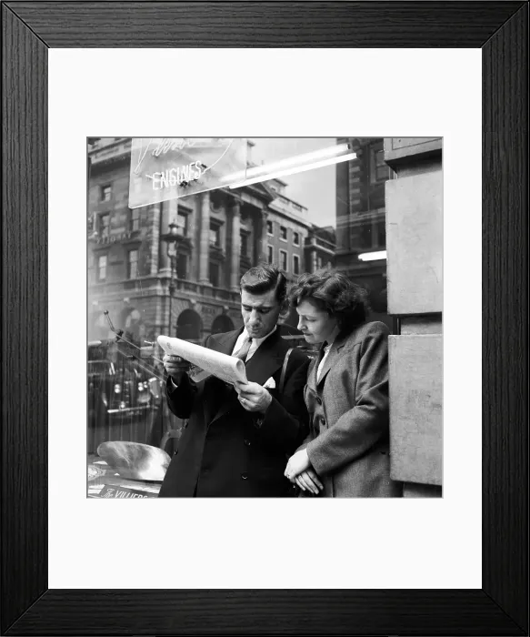 Framed Print : Sharing A Paper Framed Print : Sharing A Paper
