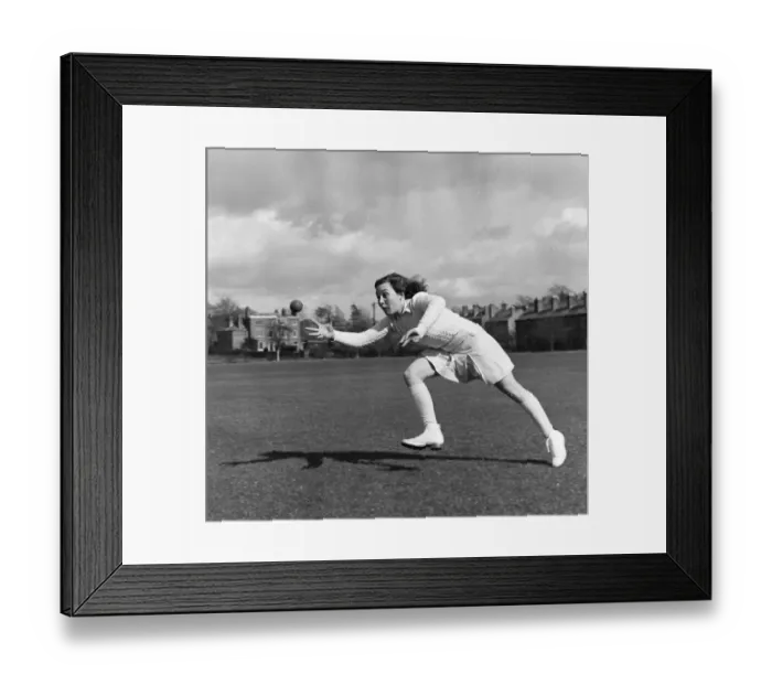 Framed Print : Catch !. 5th May 1951: Hazel Sanders goes for a catch during a training Framed Print : Catch !. 5th May 1951: Hazel Sanders goes for a catch during a training