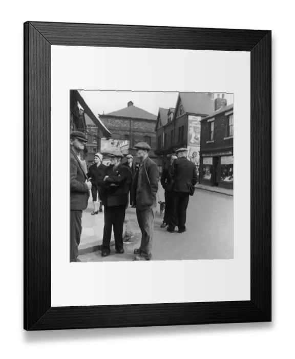 Framed Print : Jarrow. A group of men chatting on a street corner in Jarrow Framed Print : Jarrow. A group of men chatting on a street corner in Jarrow