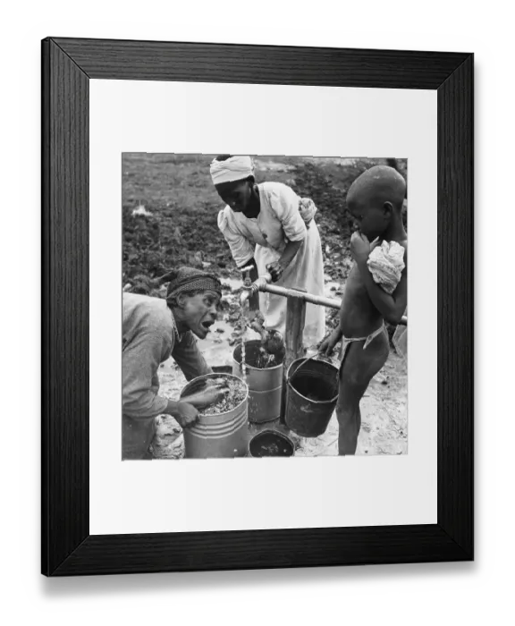 Framed Print : Collecting Water Framed Print : Collecting Water